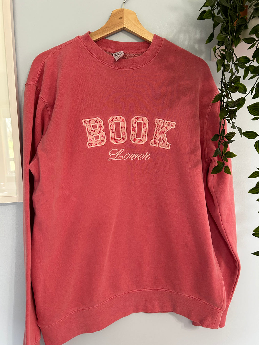 Pink Book Lover Appliqué Crewneck